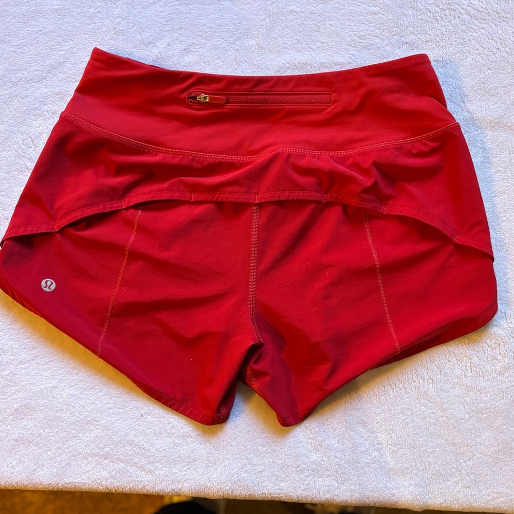 Lululemon red women’s high rise 2.5 inch short